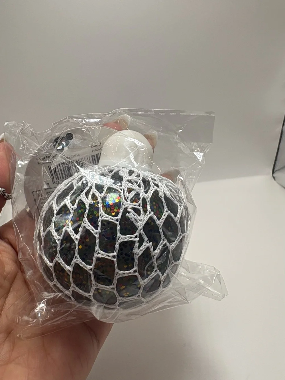 Set of 3 Mesh Stress Balls - White, Teal, Black squishy toys